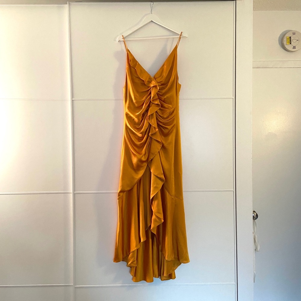 Size 12 Jonathan Simkhai front ruffle dress. Gently used. Gold color